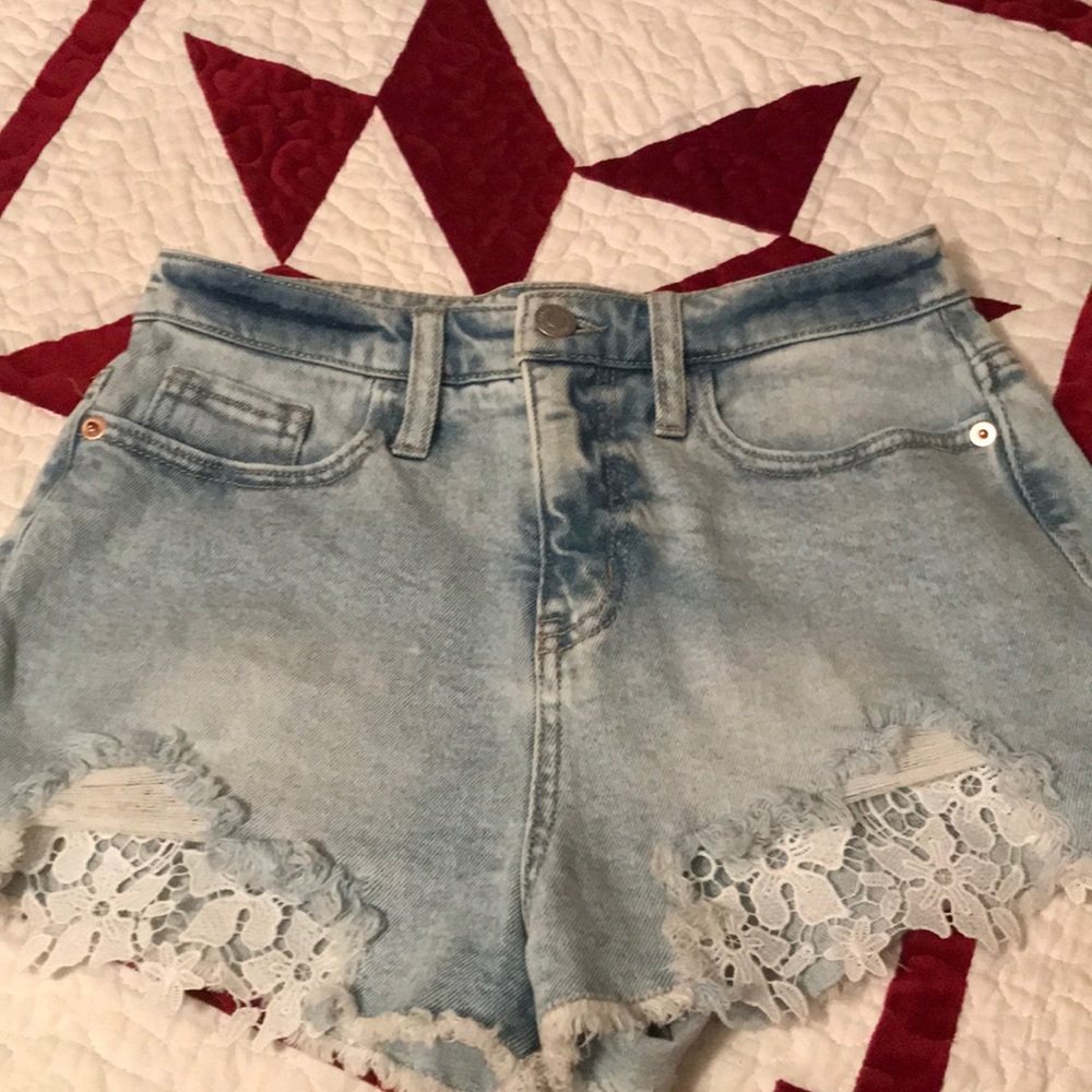 Light Jean shorts with cute flower designs !!
